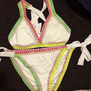 Platinum swimwear inspired by Solange Ferrarini.